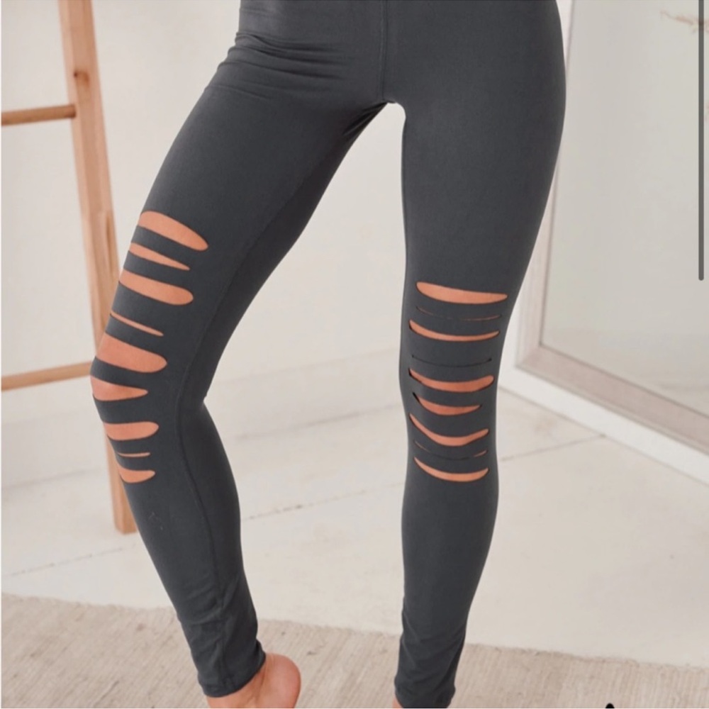NanaMacs cool composure cut out charcoal leggings.